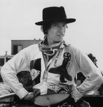 John Lydon on roof of Gunter Grove, wearing Mark Gray shirt; circa 1978 © Caroline Coon 